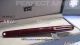 Perfect Replica New Mont blanc M Marc Newson Red & Rose Gold Rollerball (1)_th.jpg